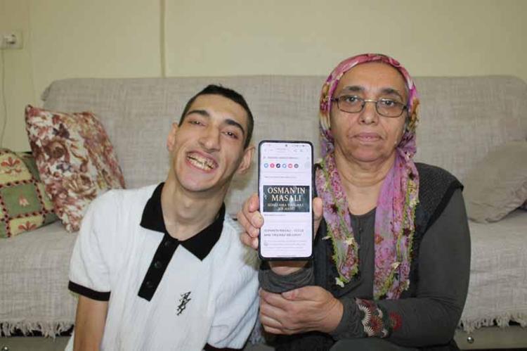 Burnu ile cep telefonu kullanan 'serebral palsili' Osman’ın hedefi kitap yazmak